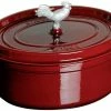 Staub 5.75 Qt. Oval Coq Au Vin Cocotte/Dutch Oven | Grenadine -Le Creuset Shop coq au vin cocotte 4 25qt grenadine 9 compressed 1