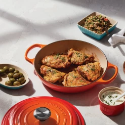 Le Creuset 2.25 Qt. Signature Enameled Cast Iron Braiser With Stainless Steel Knob | Flame Orange 12 Le Creuset 2.25 Qt. Signature Enameled Cast Iron Braiser With Stainless Steel Knob | Flame Orange -Le Creuset Shop flamebraise