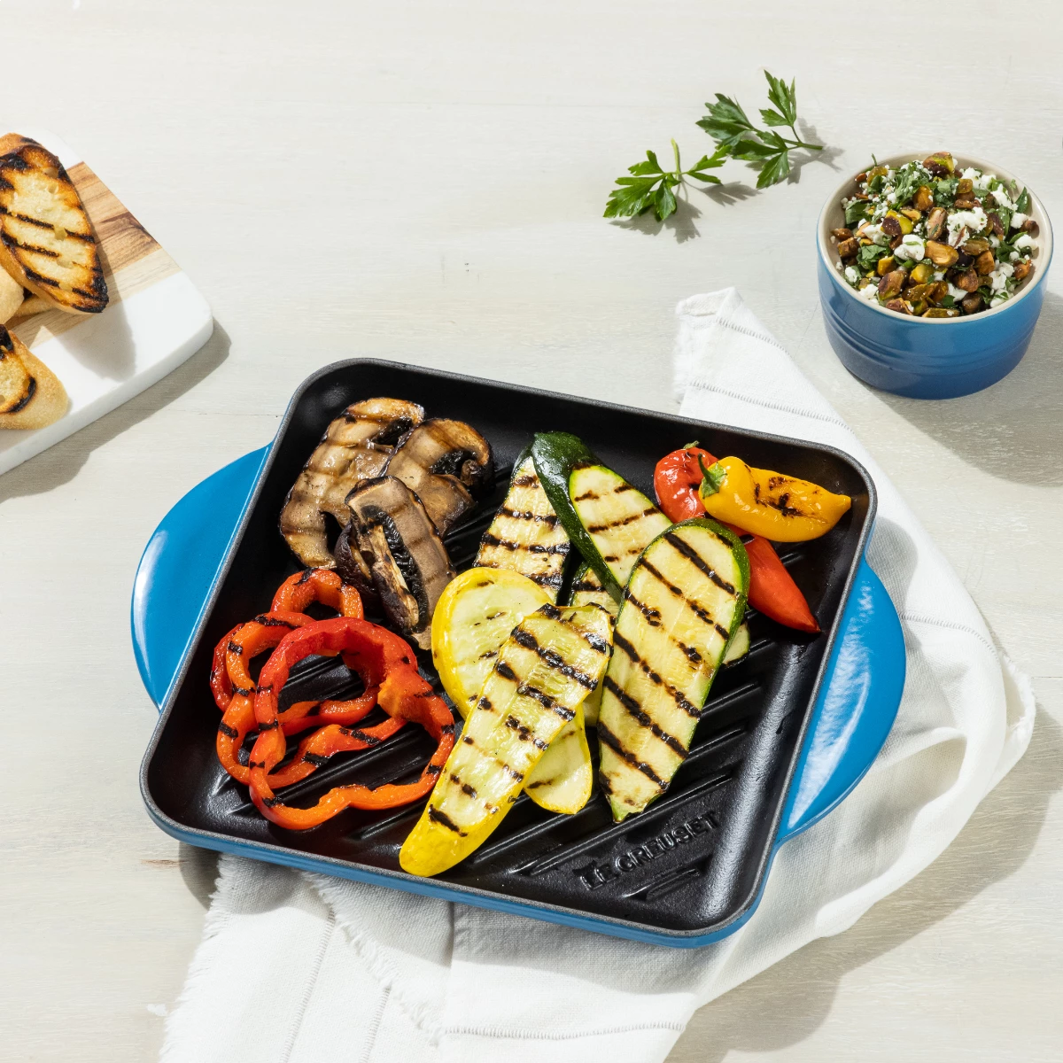 Le Creuset 9.5" Square Signature Enameled Cast Iron Grill Pan | Marseille Blue 8 Le Creuset 9.5" Square Signature Enameled Cast Iron Grill Pan | Marseille Blue - Image 6