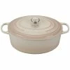 Le Creuset 9.5 Qt. Oval Signature Dutch Oven With Stainless Steel Knob | Meringue White 1 Le Creuset 9.5 Qt. Oval Signature Dutch Oven With Stainless Steel Knob | Meringue White -Le Creuset Shop meringue 9.5 qt dutch oven 1