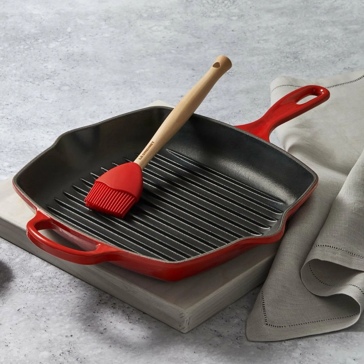 Le Creuset 10.25" Square Signature Cast Iron Grill Skillet | Cerise/Cherry Red 5 Le Creuset 10.25" Square Signature Cast Iron Grill Skillet | Cerise/Cherry Red - Image 3