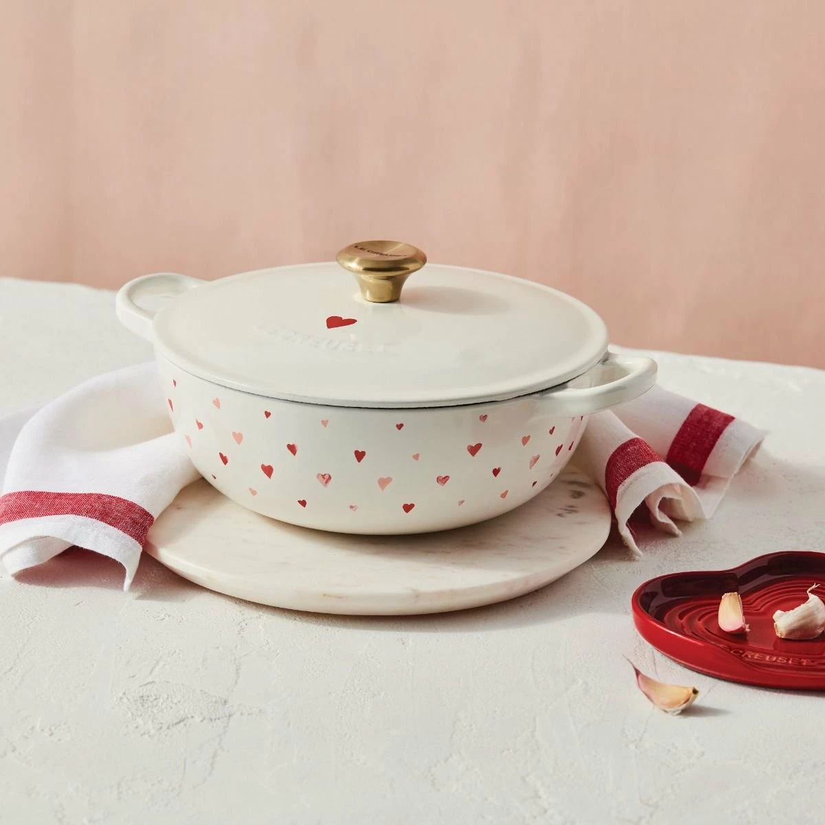 Le Creuset L'Amour 2.75 Qt. Enameled Cast Iron Soup Pot With Gold Knob & Heart Applique | White 7 Le Creuset L'Amour 2.75 Qt. Enameled Cast Iron Soup Pot With Gold Knob & Heart Applique | White - Image 5