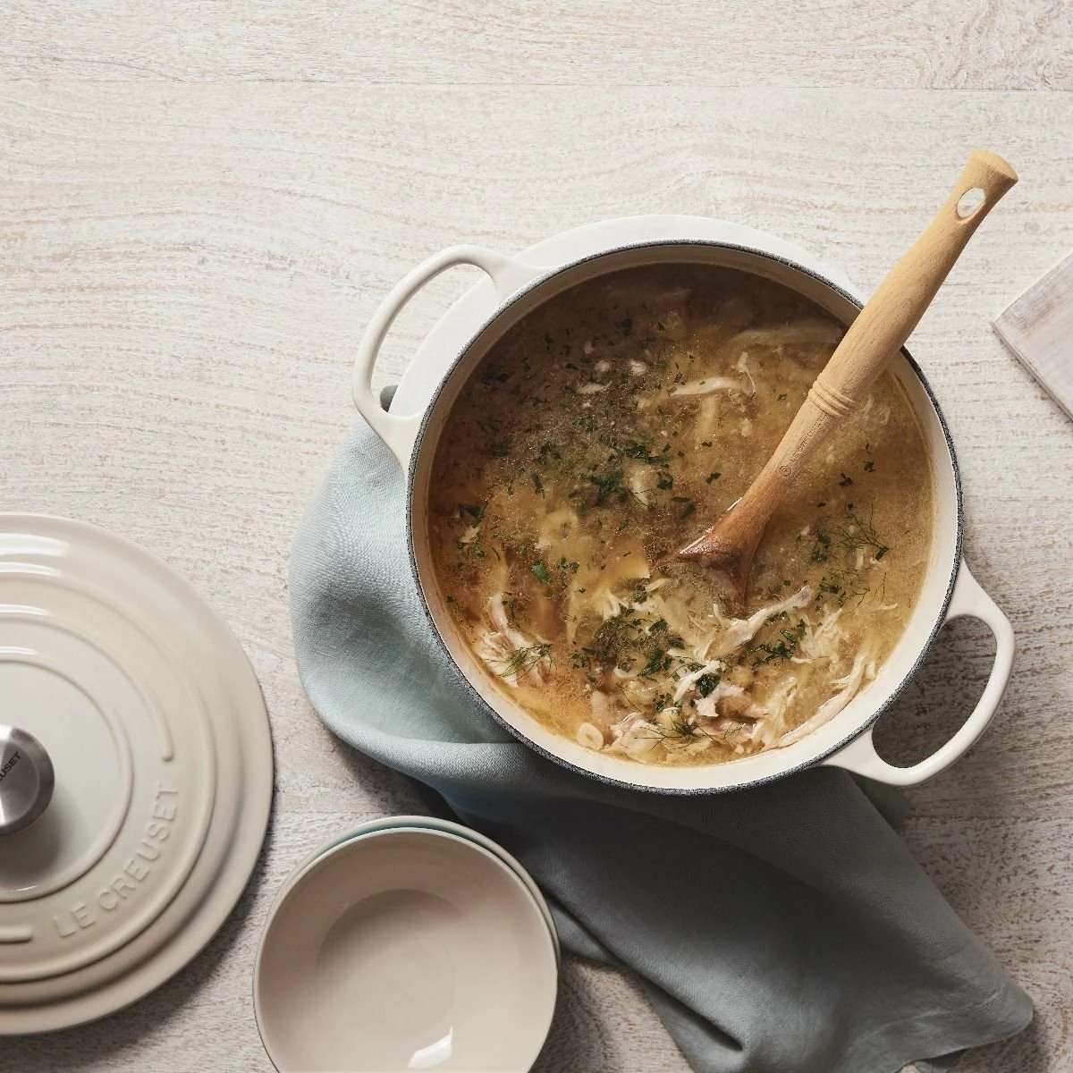 Le Creuset 5.5 Qt. Round Signature Cast Iron Dutch Oven With Stainless Steel Knob | Meringue White 5 Le Creuset 5.5 Qt. Round Signature Cast Iron Dutch Oven With Stainless Steel Knob | Meringue White - Image 3